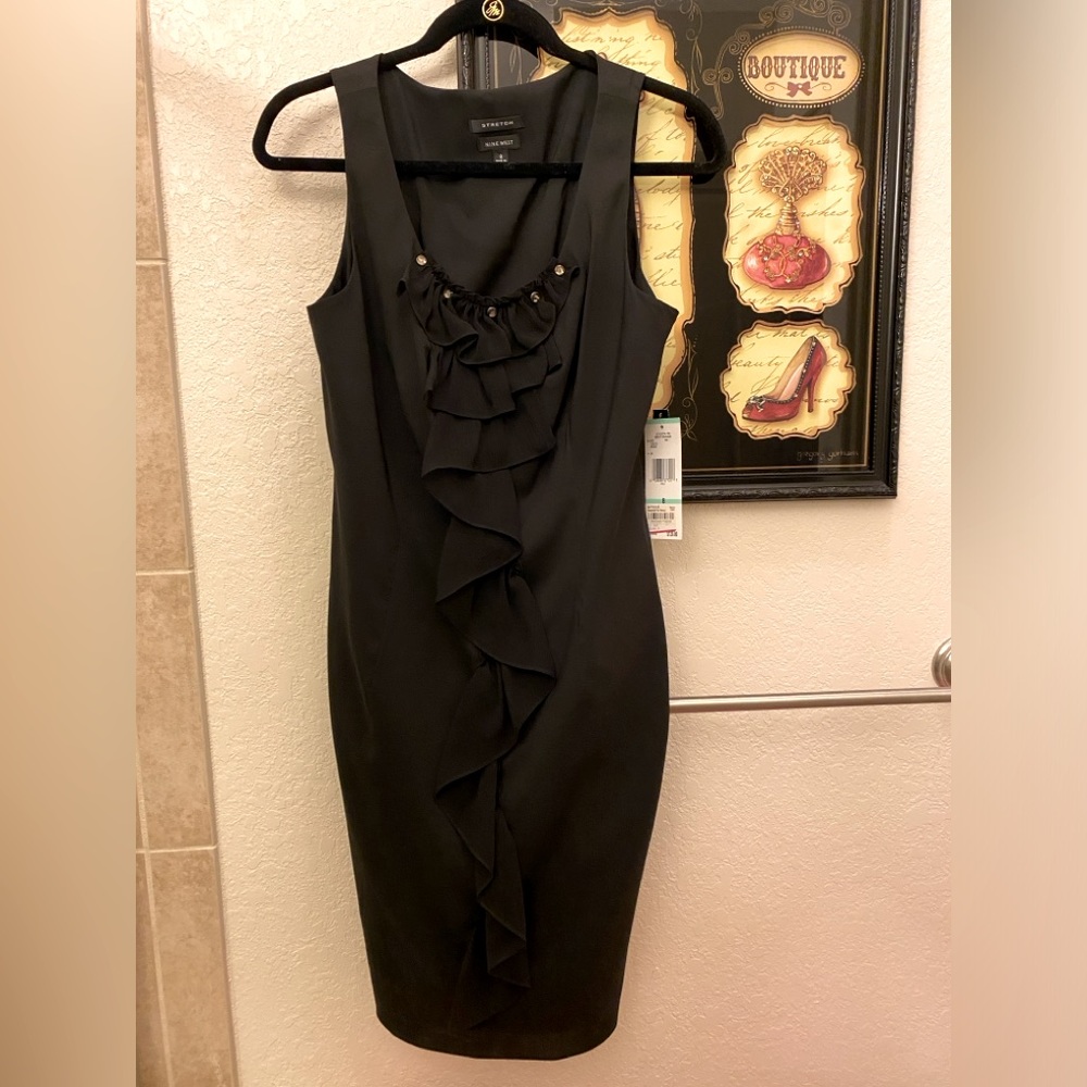 Black dress- Nine West “ Great Crusade” stretch size 8. New with tags